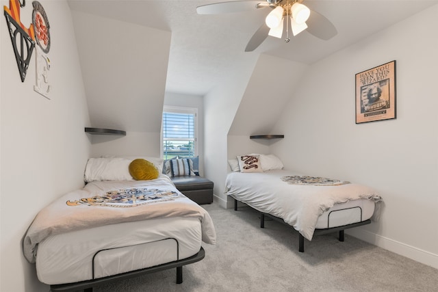 bedroom featuring light carpet, vaulted ceiling, and ceiling fan