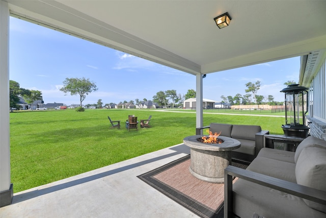 view of patio with a fire pit