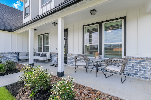 view of patio featuring a porch