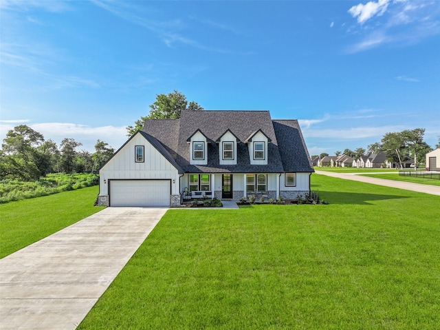 view of front of house featuring covered porch, a front lawn, and a garage