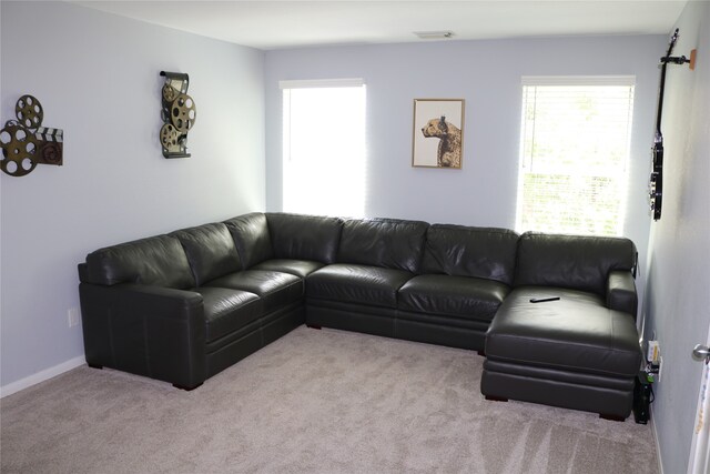 living room with light colored carpet