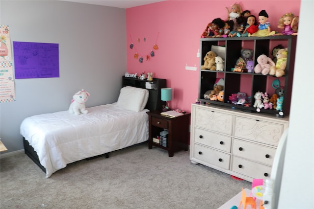 bedroom with light colored carpet