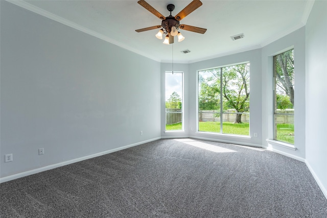 carpeted empty room with crown molding and ceiling fan