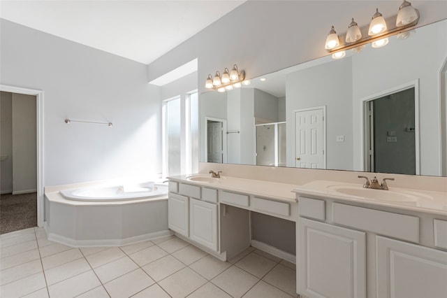 bathroom with vanity, independent shower and bath, and tile patterned flooring