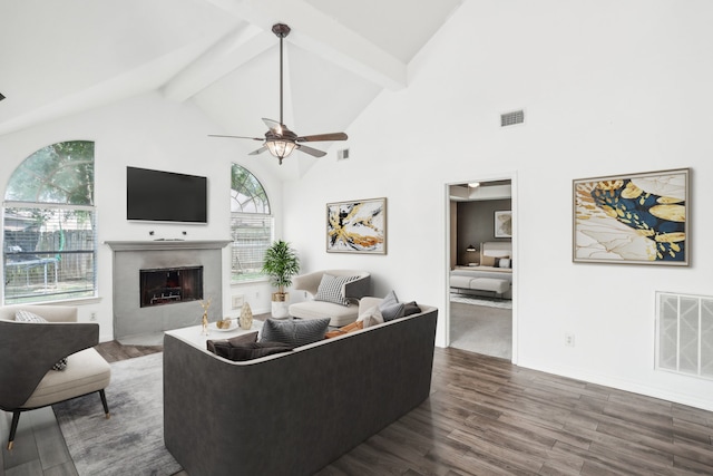 living room featuring beam ceiling, ceiling fan, dark hardwood / wood-style flooring, and high vaulted ceiling