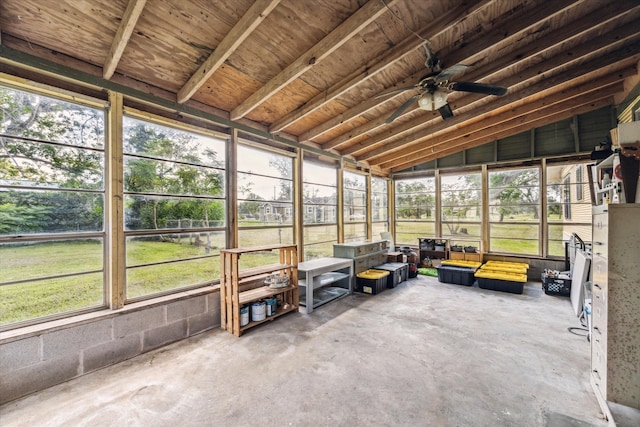 unfurnished sunroom featuring lofted ceiling and ceiling fan