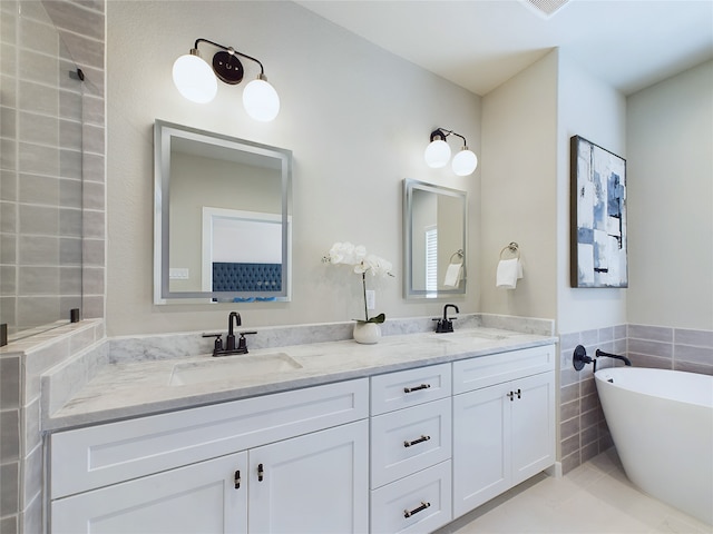 bathroom featuring tile walls, tile patterned floors, independent shower and bath, and vanity