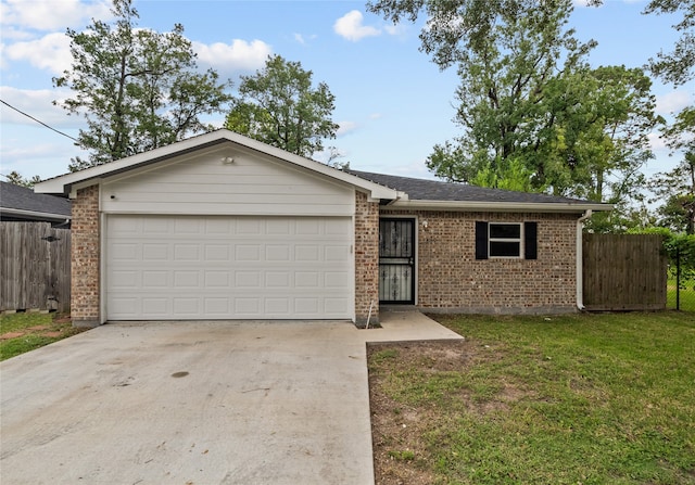 ranch-style house with a front yard and a garage