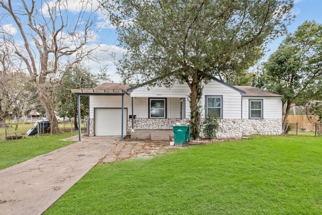 ranch-style home with a front lawn and a garage