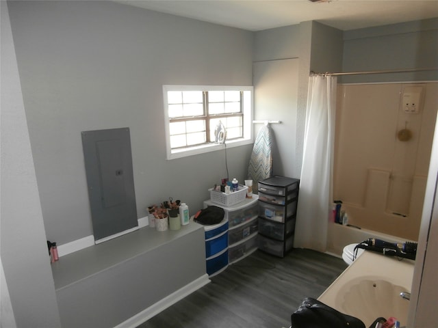 full bathroom with hardwood / wood-style flooring, vanity, toilet, and shower / bath combination with curtain