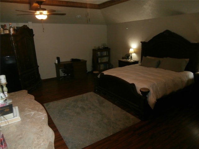 bedroom featuring lofted ceiling with beams, ceiling fan, and dark hardwood / wood-style floors