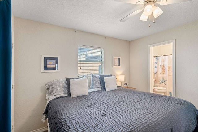 bedroom featuring ensuite bathroom, a textured ceiling, and ceiling fan