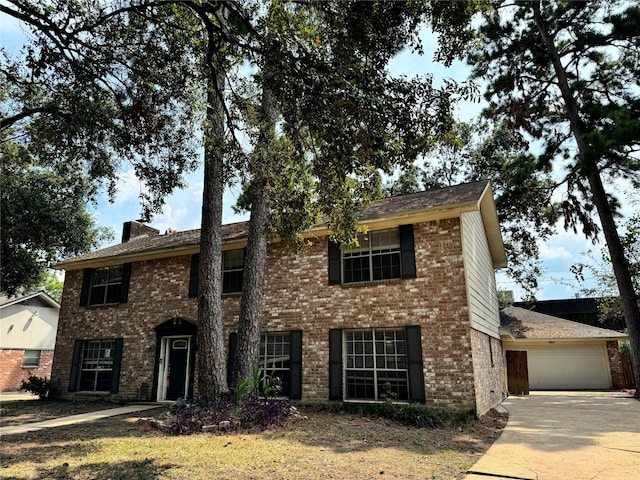 colonial home featuring a garage