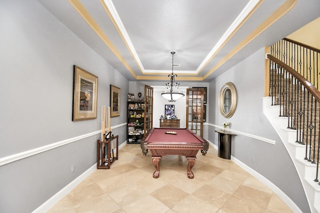 playroom with pool table and a raised ceiling