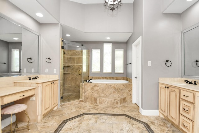 15 Bees Creek Ct, Missouri City, TX 77459 - full bathroom featuring marble tiled flooring, a shower stall, a garden tub, recessed lighting, and two vanities