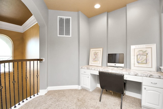 15 Bees Creek Ct, Missouri City, TX 77459 - home office with built in desk, light carpet, arched walkways, crown molding, and baseboards