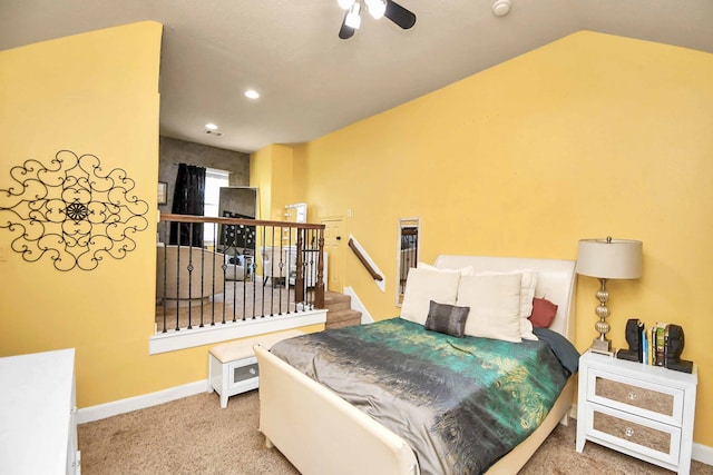 bedroom with vaulted ceiling, carpet floors, and ceiling fan