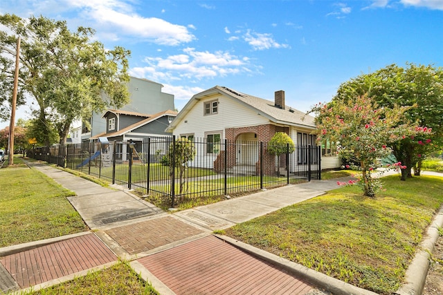 exterior space featuring a front yard and a garage