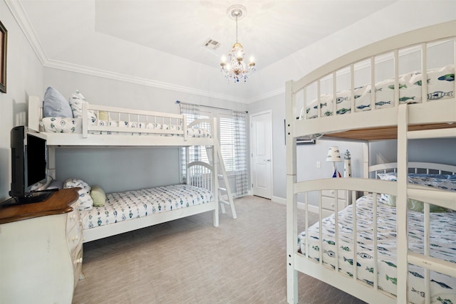 carpeted bedroom with an inviting chandelier, crown molding, and a raised ceiling