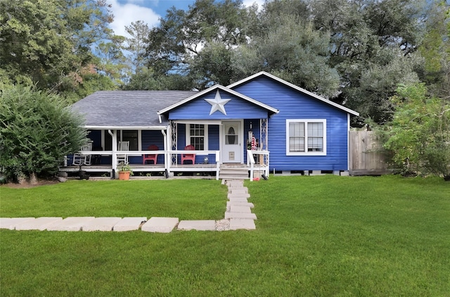 view of front of home with a front lawn and covered porch