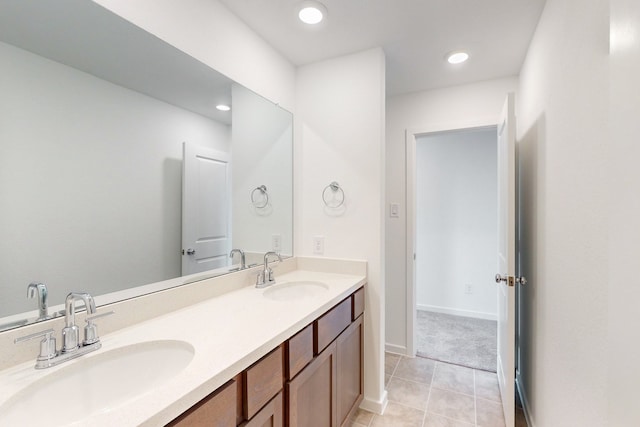 bathroom with vanity and tile patterned flooring