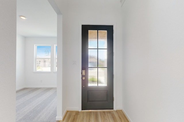 doorway featuring light hardwood / wood-style floors