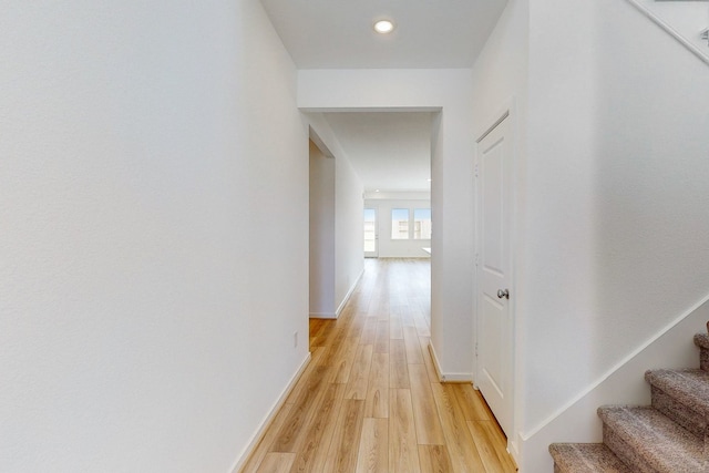 hall with light hardwood / wood-style flooring