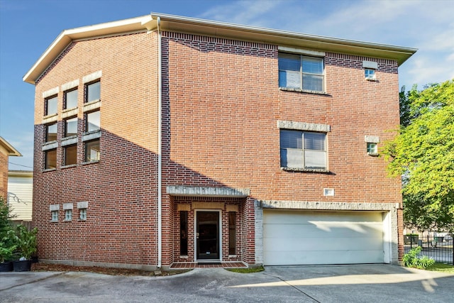 exterior space with a garage