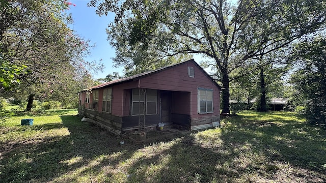 exterior space with a yard