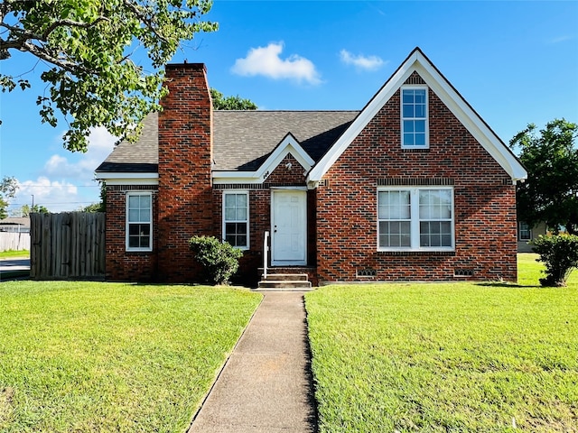 view of front of home with a front lawn