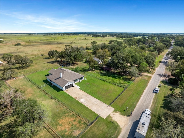 birds eye view of property with a rural view