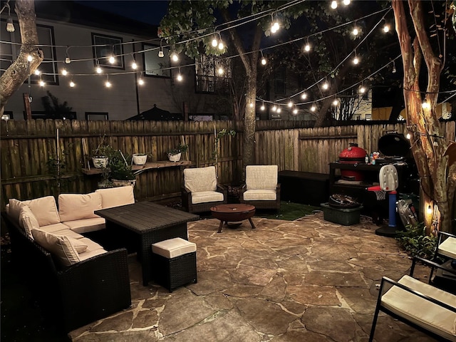 patio at night with outdoor lounge area