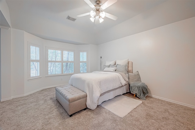 bedroom featuring light carpet and ceiling fan