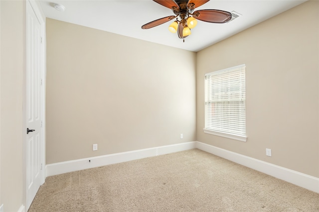 unfurnished room with carpet floors and ceiling fan