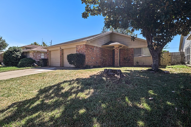 ranch-style house featuring a front yard and a garage