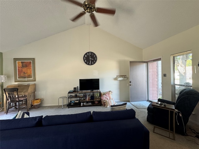 living room with light carpet, lofted ceiling, and ceiling fan