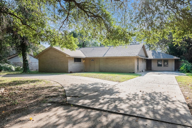 ranch-style home with a garage