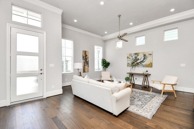 living room featuring crown molding, ceiling fan, and dark hardwood / wood-style flooring