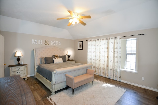 bedroom featuring wood-type flooring, vaulted ceiling, and ceiling fan