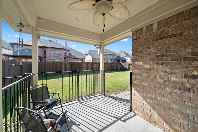 view of patio / terrace featuring ceiling fan