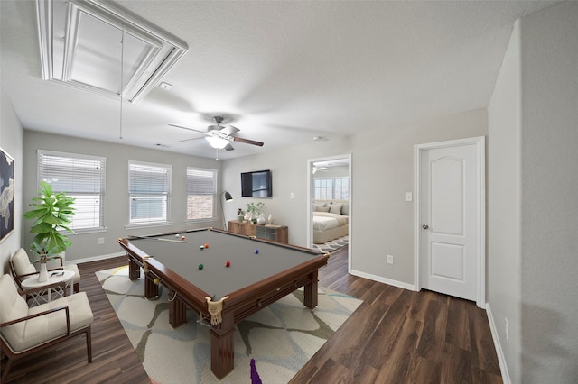 rec room featuring ceiling fan, a textured ceiling, pool table, and dark wood-type flooring