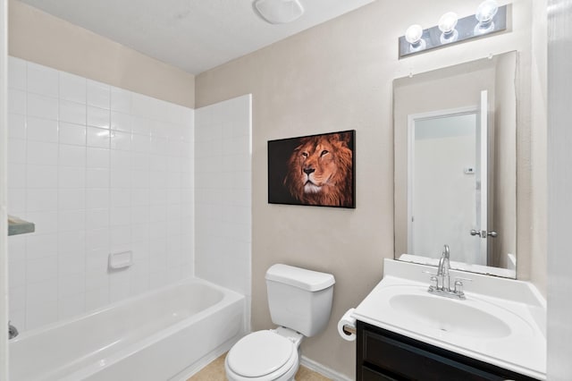 full bathroom with vanity, tiled shower / bath combo, and toilet