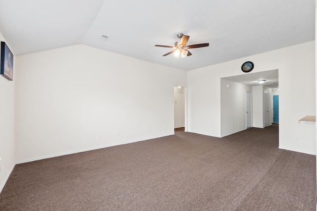 carpeted empty room with ceiling fan and lofted ceiling