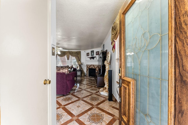hallway featuring a textured ceiling