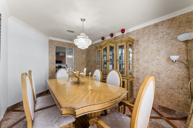 unfurnished dining area with a chandelier and crown molding