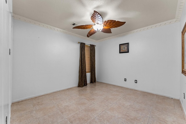 spare room with ceiling fan, light tile patterned flooring, crown molding, and visible vents