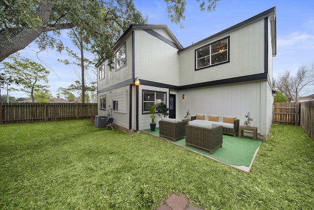 back of property with a patio, a yard, central AC unit, and an outdoor hangout area