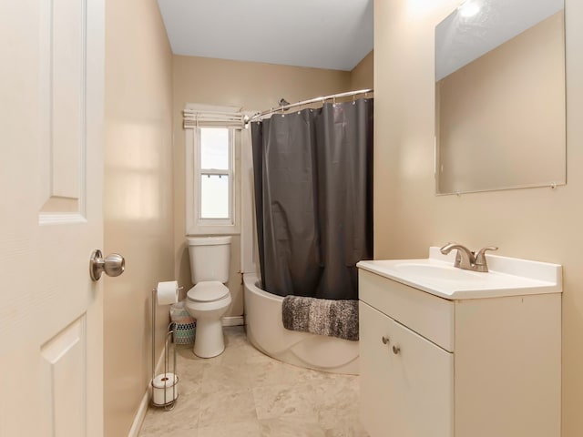 full bathroom featuring shower / bath combo with shower curtain, vanity, and toilet