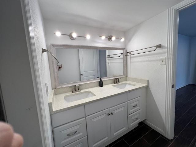 bathroom featuring vanity and tile patterned floors