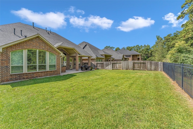 view of yard with a patio area